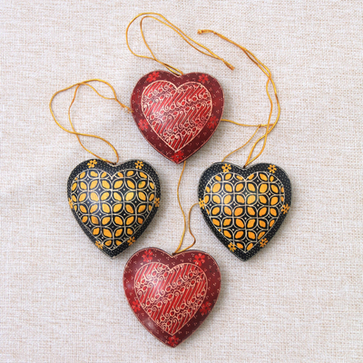 Batik wood ornaments, 'Traditional Hearts' (set of 4) - Traditional Batik Wood Heart Ornaments from Java (Set of 4)