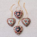 Batik wood ornaments, 'Heart Flowers' (set of 4) - Floral Batik Wood Heart Ornaments from Java (Set of 4)