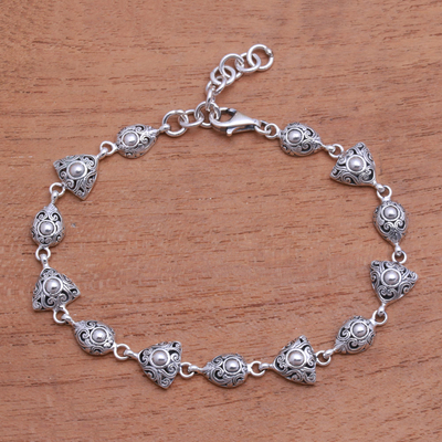 Sterling silver link bracelet, 'Elegance of Swirls' - Swirl Pattern Sterling Silver Link Bracelet from Bali