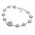 Blue topaz pendant bracelet, 'Triangle of Swirls' - Triangular Blue Topaz Pendant Bracelet from Bali