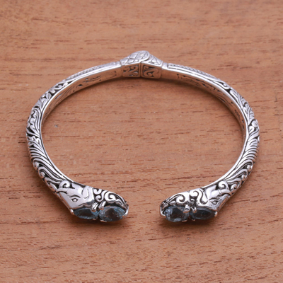 Blue topaz cuff bracelet, 'Elephant's Treasure' - Elephant Motif Blue Topaz Cuff Bracelet from Bali