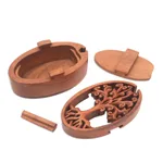 Wood puzzle box, 'Tree Oval' - Tree-Themed Suar Wood Puzzle Box from Bali
