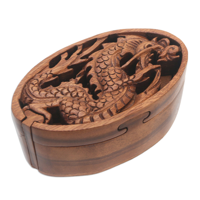 Caja de rompecabezas de madera, 'Dragon Oval' - Caja de rompecabezas de madera de Suar con temática de dragones de Bali