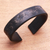 Leather cuff bracelet, 'Hidden Stars in Black' - Subtle Star Motif Black Leather Cuff Bracelet from Bali thumbail