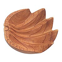 Suar wood catchall, 'Secure' (7.5 inch) - Suar Wood Clam Shell Motif Hand Carved Catchall from Bali