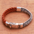 Leather and sterling silver bracelet, 'Majestic Duo in Brown' - Brown Braided Leather and Sterling Silver Bracelet