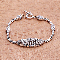 Sterling silver pendant bracelet, 'Flower Panel' - Floral Sterling Silver Pendant Bracelet from Bali