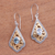 Gold accented blue topaz dangle earrings, 'Glamorous Kites' - Swirl Pattern Gold Accented Blue Topaz Dangle Earrings