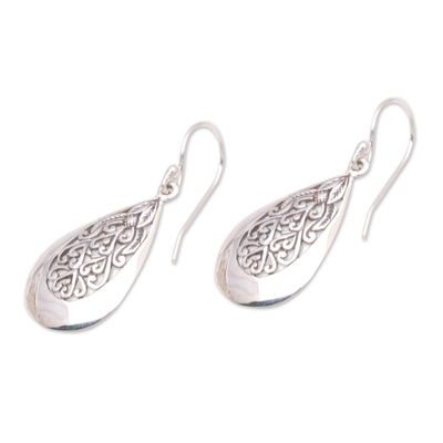 Sterling silver dangle earrings, 'Hidden Flower' - Drop-Shaped Floral Sterling Silver Dangle Earrings from Bali