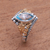 Gold accented blue topaz single-stone ring, 'Marquise Order' - Gold Accented Marquise Blue Topaz Single-Stone Ring