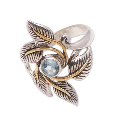 Gold accented blue topaz cocktail ring, 'Wreathed in Leaves' - Leafy Gold Accented Blue Topaz Cocktail Ring from Bali
