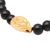 Gold accented onyx beaded stretch bracelet, 'Bear's Strength - Gold Accented Bear-Themed Onyx Beaded Stretch Bracelet