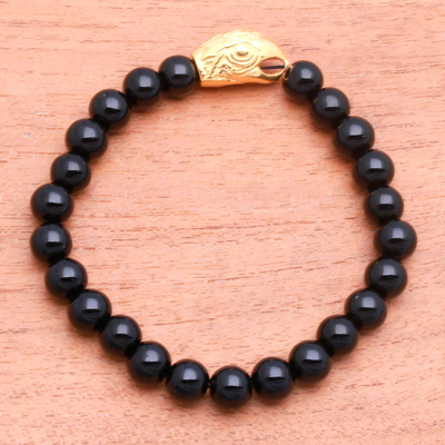 Gold accented onyx beaded stretch bracelet, 'Alert Eagle' - Gold Accented Eagle-Themed Onyx Beaded Stretch Bracelet