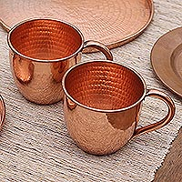 Copper mugs, 'Warm Glow' (pair) - Hammered Copper Mugs Crafted in Java (Pair)