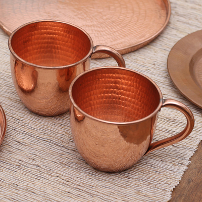 Copper mugs, 'Warm Glow' (pair) - Hammered Copper Mugs Crafted in Java (Pair)