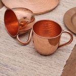 Copper mugs, 'Warm Glow' (pair) - Hammered Copper Mugs Crafted in Java (Pair)