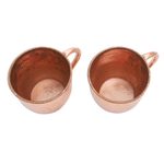 Copper mugs, 'Warm Glow' (pair) - Hammered Copper Mugs Crafted in Java (Pair)