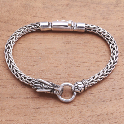 Sterling silver pendant bracelet, 'Clutching Ring' - Dragon-Themed Sterling Silver Pendant Bracelet from Bali