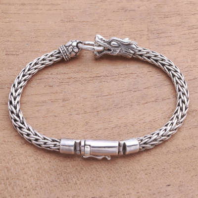 Sterling silver pendant bracelet, 'Dragon Grasp' - Dragon-Themed Sterling Silver Pendant Bracelet from Bali