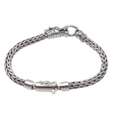 Sterling silver pendant bracelet, 'Clutching Ring' - Dragon-Themed Sterling Silver Pendant Bracelet from Bali