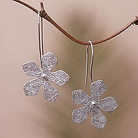 Sterling silver dangle earrings, 'Spinning Frangipani' - Sterling Silver Frangipani Flower Dangle Earrings from Bali