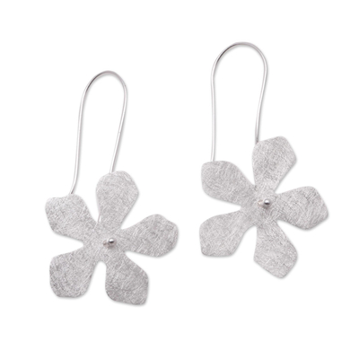 Sterling silver dangle earrings, 'Spinning Frangipani' - Sterling Silver Frangipani Flower Dangle Earrings from Bali