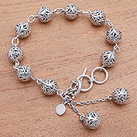 Sterling silver link bracelet, 'Round Constellation' - Swirl Pattern Sterling Silver Link Bracelet from Java