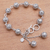 Sterling silver link bracelet, 'Round Constellation' - Swirl Pattern Sterling Silver Link Bracelet from Java