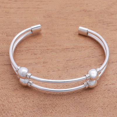 Sterling silver cuff bracelet, 'Bauble Twins' - High-Polish Sterling Silver Cuff Bracelet with Baubles