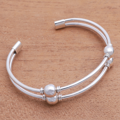 Sterling silver cuff bracelet, 'Bauble Twins' - High-Polish Sterling Silver Cuff Bracelet with Baubles