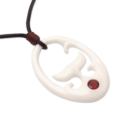 Bone and garnet pendant necklace, 'Rising Tail' - Bone and Garnet Whale Tail Pendant Necklace from Bali