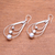 Sterling silver dangle earrings, 'Droplet Orbits' - Drop-Shaped Sterling Silver Dangle Earrings from Bali