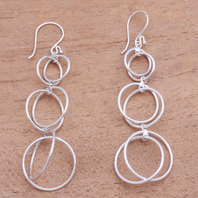 Sterling silver dangle earrings, 'Interlocking Orbits' - Circular Sterling Silver Dangle Earrings from Bali