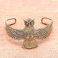 Brass cuff bracelet, 'Flying Owl' - Owl-Themed Brass Cuff Bracelet from Indonesia