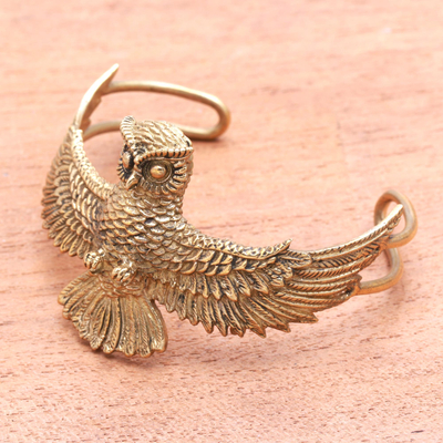 Brass cuff bracelet, 'Flying Owl' - Owl-Themed Brass Cuff Bracelet from Indonesia