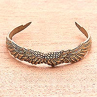 Brass cuff bracelet, 'Caressing Wings' - Wing-Themed Brass Cuff Bracelet from Indonesia