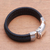 Men's braided leather wristband bracelet, 'Blessing of Strength in Black' - Men's Black Leather Braided Wristband Bracelet from Bali