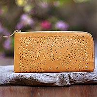 Leather clutch, 'Scattered Stars in Amber' - Floral Pattern Leather Clutch in Amber from Bali