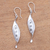 Sterling silver dangle earrings, 'Leafy Shapes' - Swirl Pattern Sterling Silver Dangle Earrings from Bali