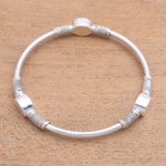 Sterling silver bangle bracelet, 'Oval Trio' - Oval Pattern Sterling Silver Bangle Bracelet from Bali