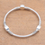 Sterling silver bangle bracelet, 'Oval Trio' - Oval Pattern Sterling Silver Bangle Bracelet from Bali (image 2) thumbail