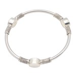 Sterling silver bangle bracelet, 'Oval Trio' - Oval Pattern Sterling Silver Bangle Bracelet from Bali