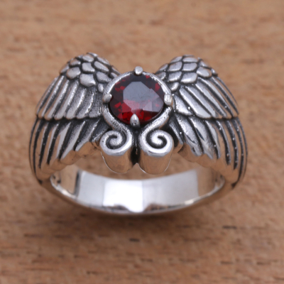 Garnet band ring, 'Winged Glitter' - Wing Motif Garnet Band Ring from Bali