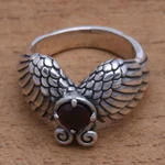 Garnet cocktail ring, 'Winged Glitter' - Wing Motif Garnet Band Ring from Bali