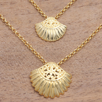 Gold plated double strand necklace, 'Gleaming Shells' - Gold Plated Sterling Silver Clam Shell Pendant Necklace