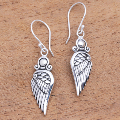 Sterling silver dangle earrings, 'Flirty Wings' - Wing-Shaped Sterling Silver Dangle Earrings from Bali