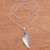 Garnet pendant necklace, 'One Wing' - Wing-Themed Garnet Pendant Necklace from Bali thumbail