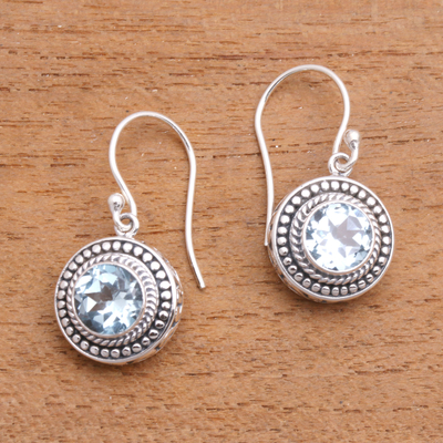 Blue topaz dangle earrings, 'Loving Gaze' - Artisan Crafted Balinese Blue Topaz and Silver Earrings