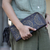 Leather clutch, 'Borobudur Stars in Coffee' - Circle Pattern Leather Clutch in Espresso from Bali