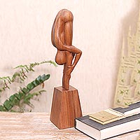 Wood sculpture, 'Yoga Expert' - Hand-Carved Yoga-Themed Suar Wood Sculpture from Bali